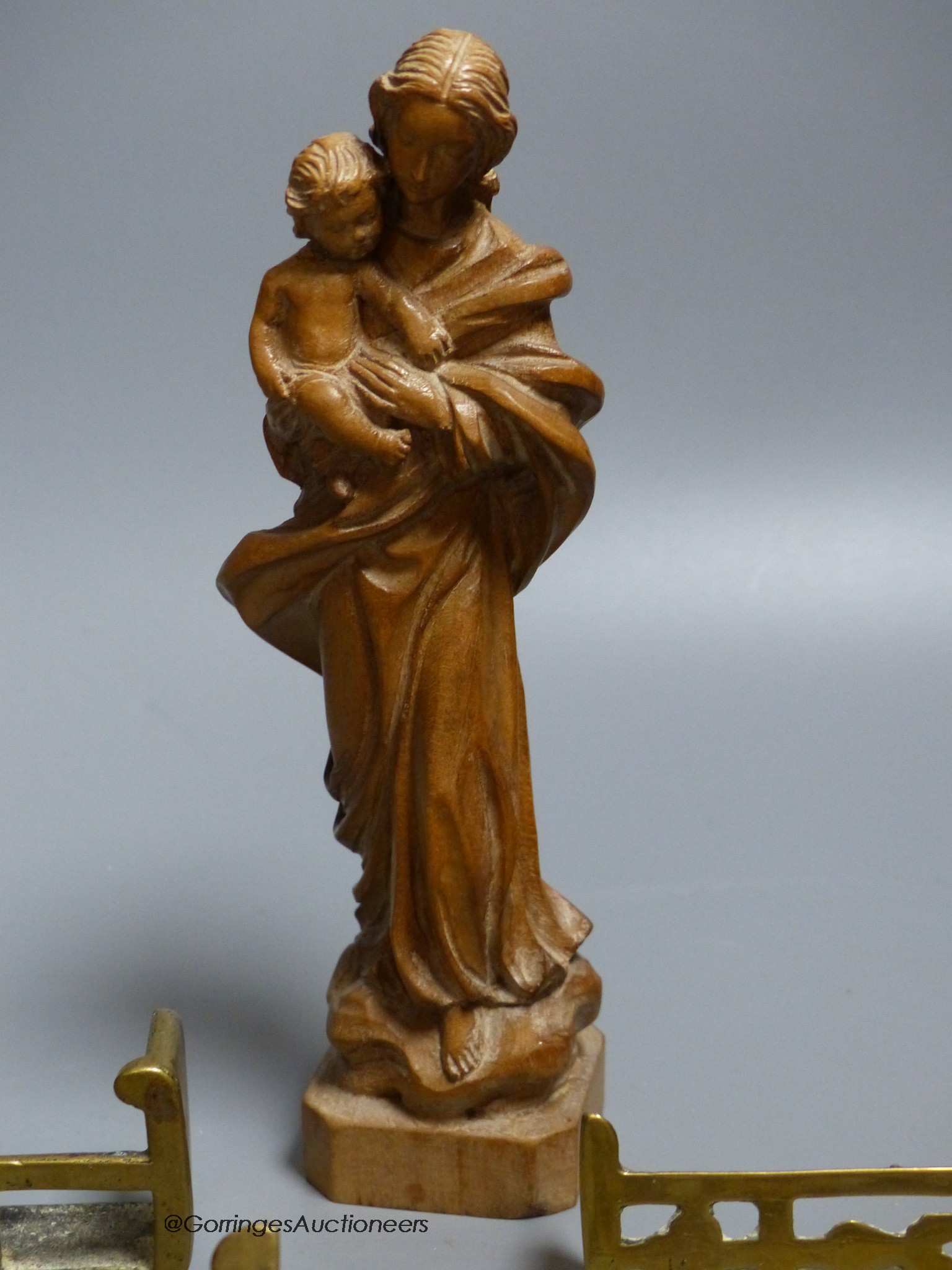 A limewood Madonna and child, height 20cm, and six miniature fenders